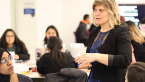 Brianne Orr-Alvarez instructing students in a class