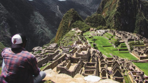 Young man overlooking Machu Pichu