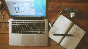 Laptop, notebook, and pen