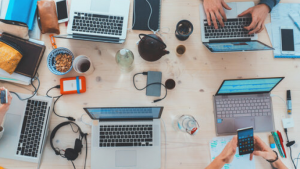 Laptops and cellphones on a table